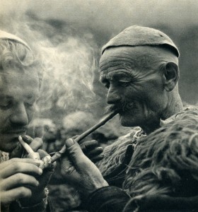 GM041: Two men smoking in the Shala Valley (Photo: Giuseppe Massani, 1940).